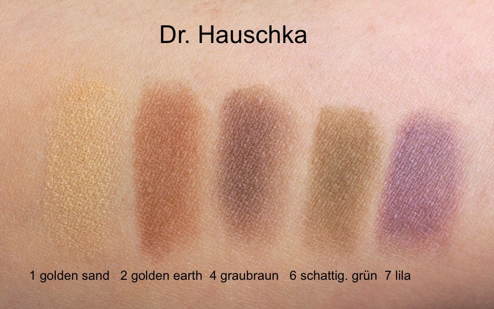 Swatches: Dr. Hauschka golden sand, golden earth, graubraun, schattiges grün, lila